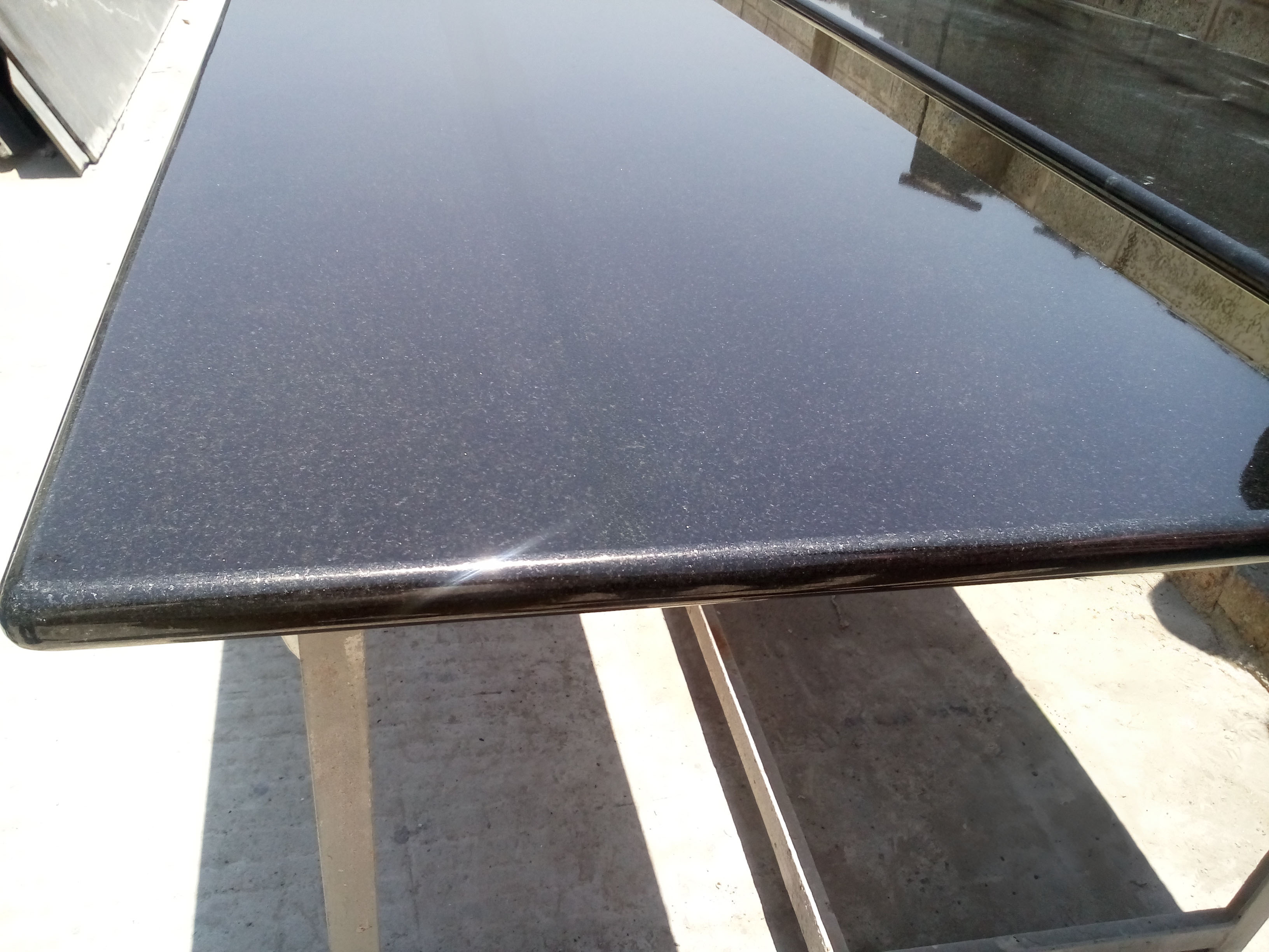 Absolute black counter top with full bullnose edge