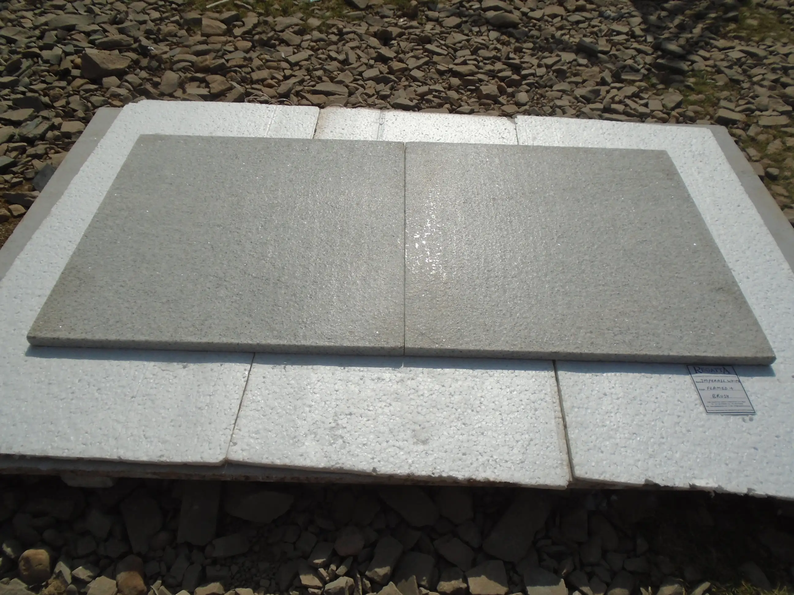Imperial white flamed brushed tile