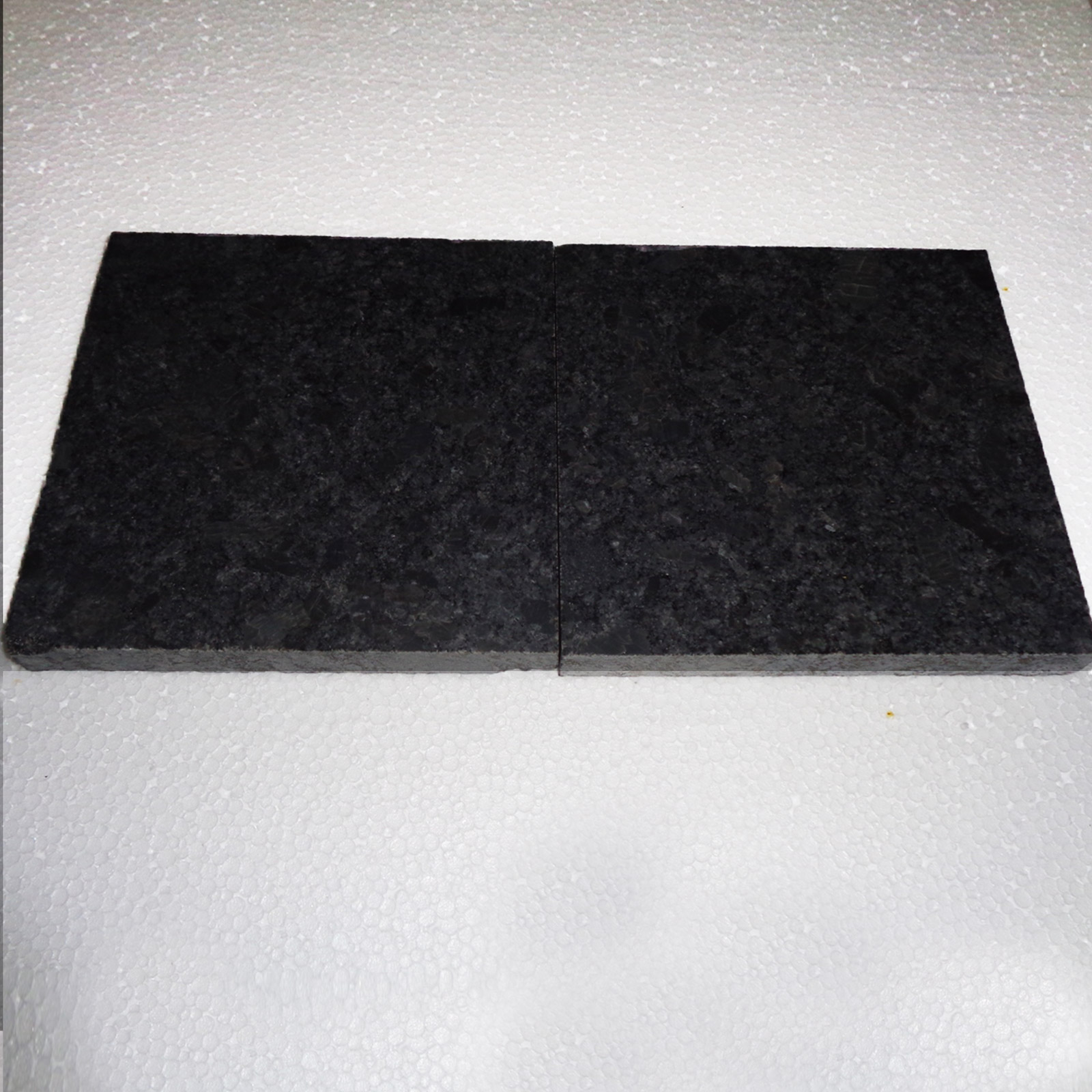 Steel grey granite tiles in honed finish